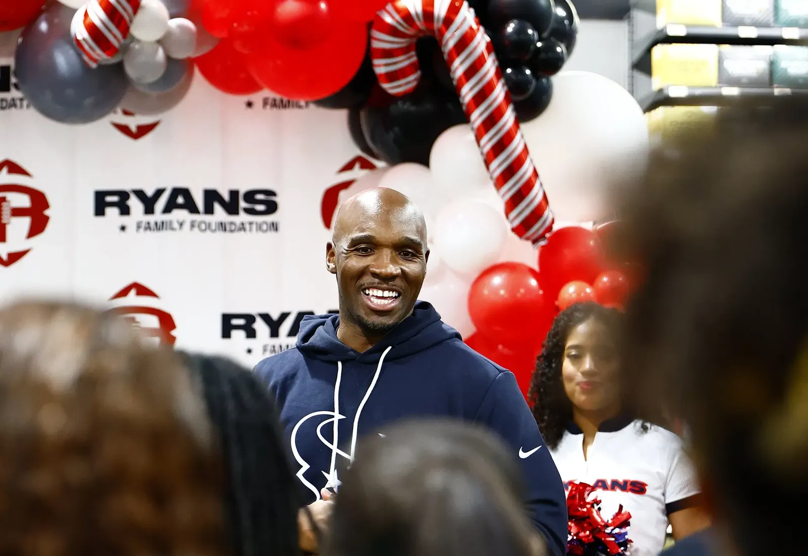 DeMeco Ryans at the Ryans Family Foundation holiday event