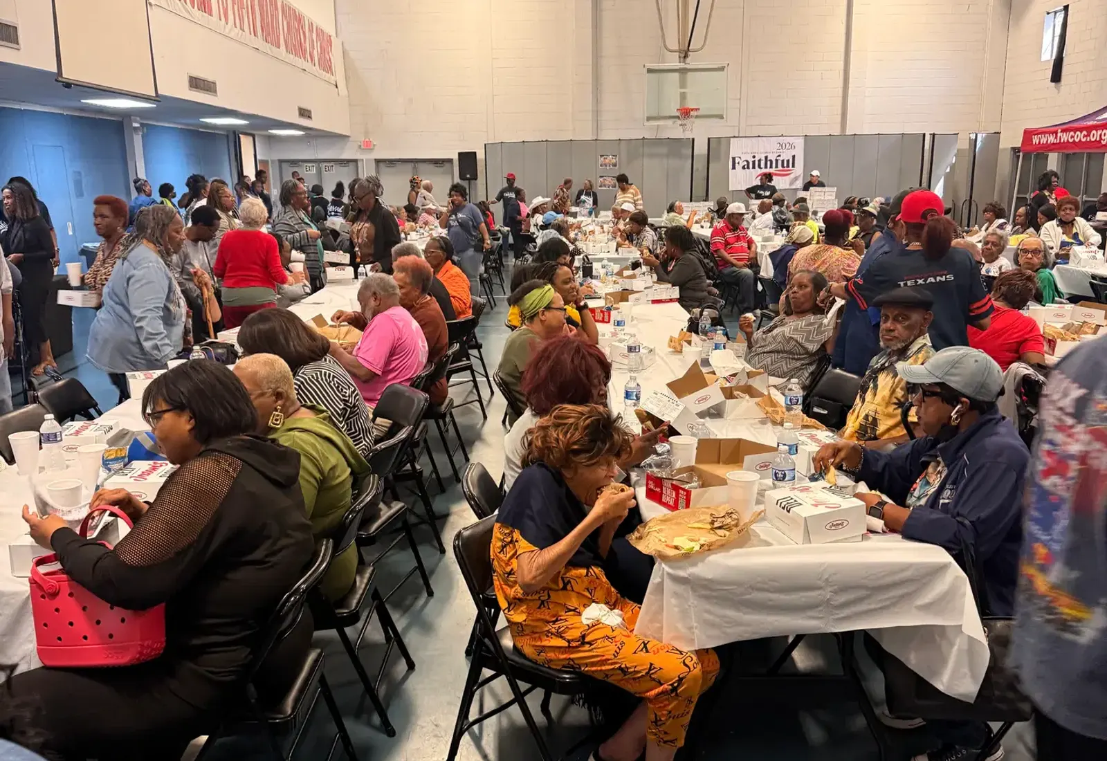 Neighbors gathered for a Fifth Ward community event at Fifth Ward Church of Christ